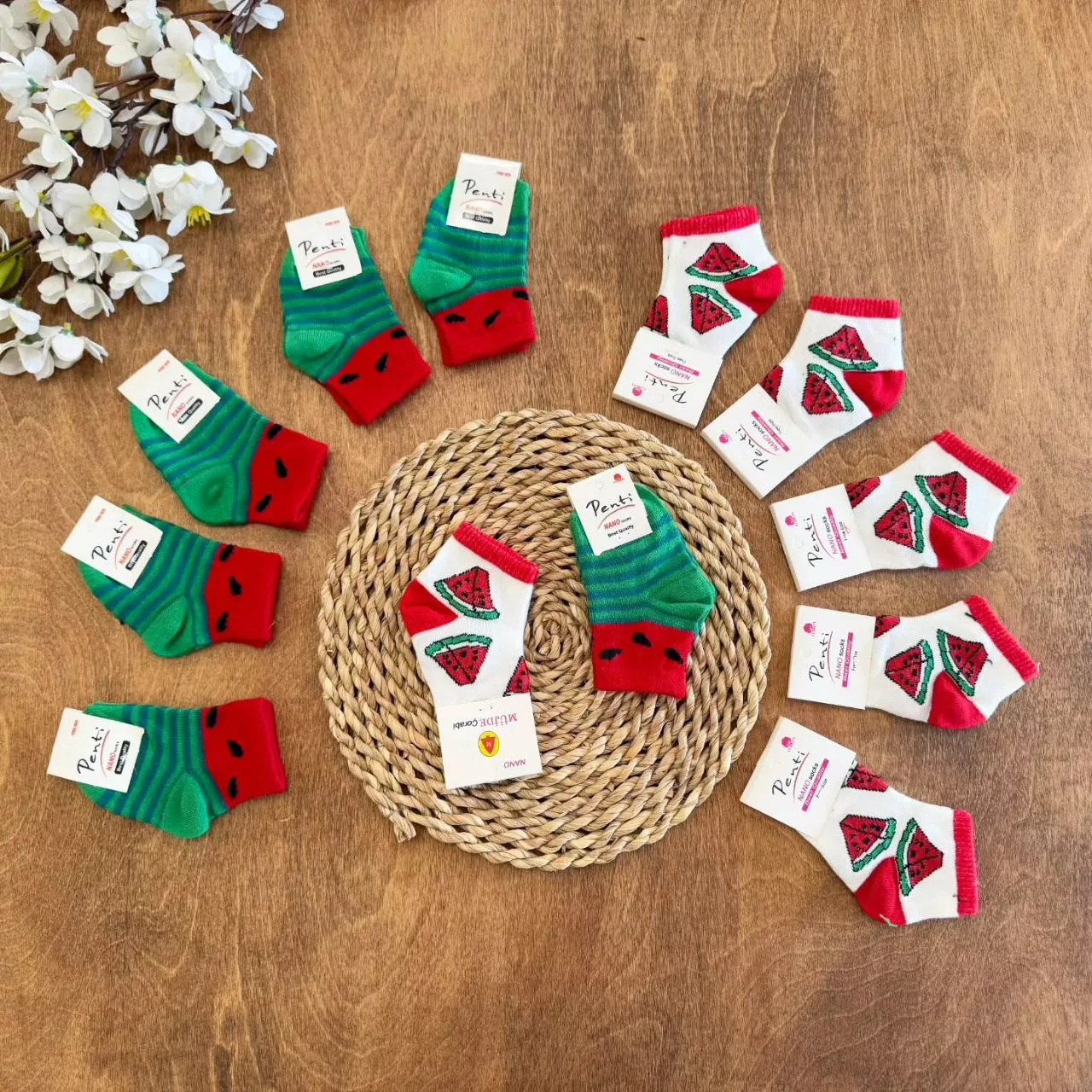 جوراب نوزادی سفید و سبز هندوانه کد ۵۶۲۲