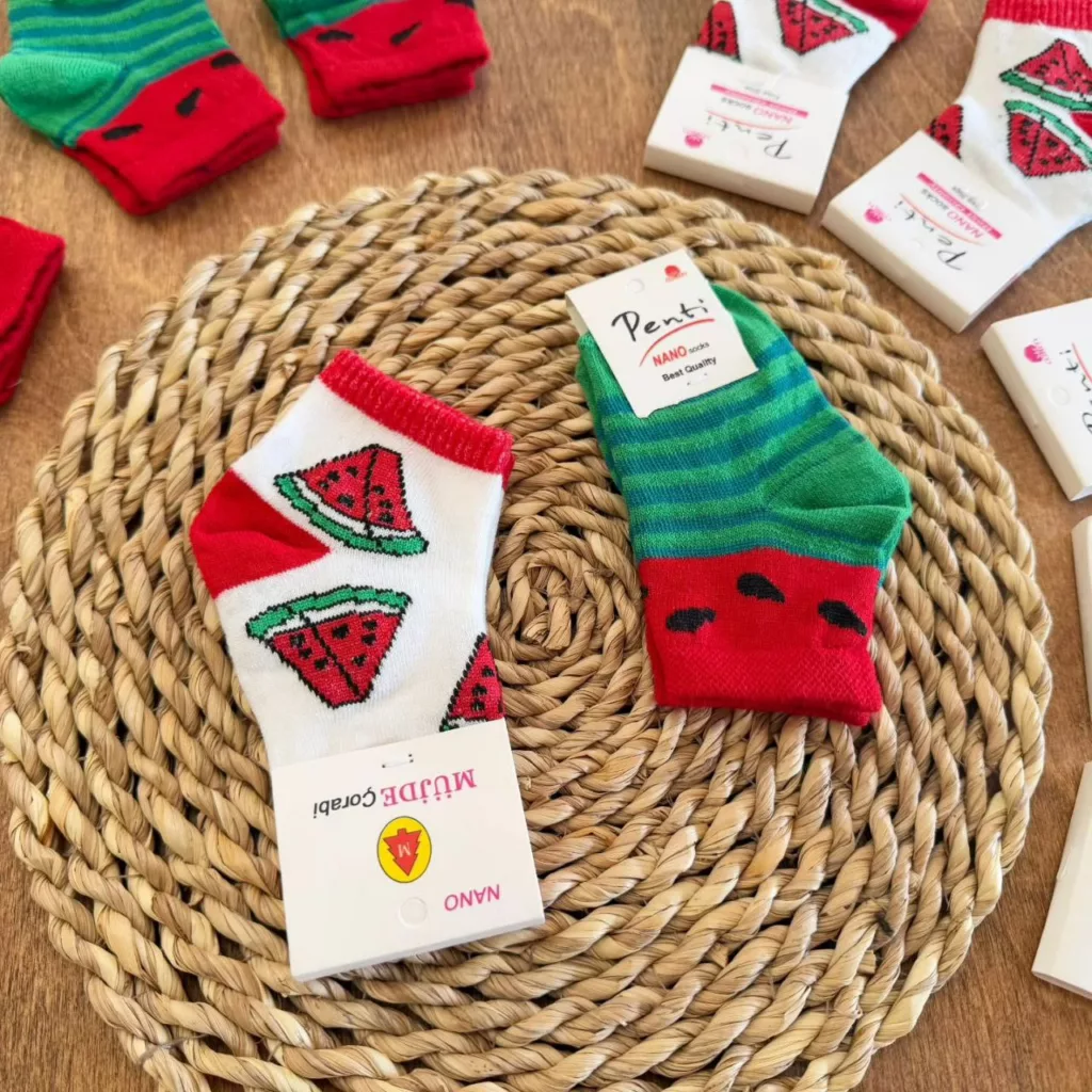 جوراب نوزادی سفید و سبز هندوانه کد ۵۶۲۲